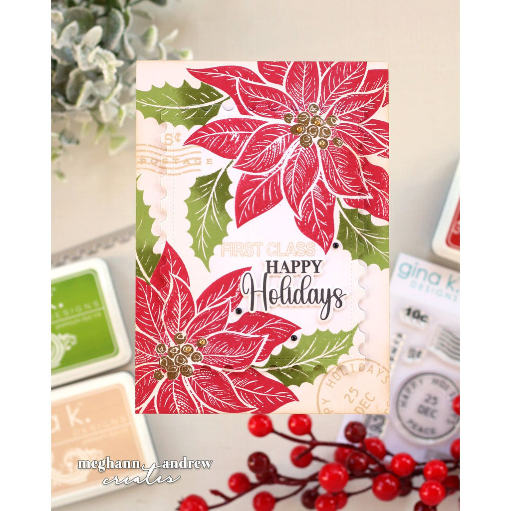 A handmade holiday greeting card featuring red poinsettias, green holly leaves, and 'HAPPY Holidays' text, styled with stamps and red berries on a neutral background.