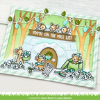 A handmade layered card featuring cute cartoon mice around a small white igloo with a wooden door and a brown banner reading 'YOU'RE ON THE MICE LIST'. The card includes green striped borders, string lights, trees, and small die-cut mouse decorations, photographed on a white wood surface.