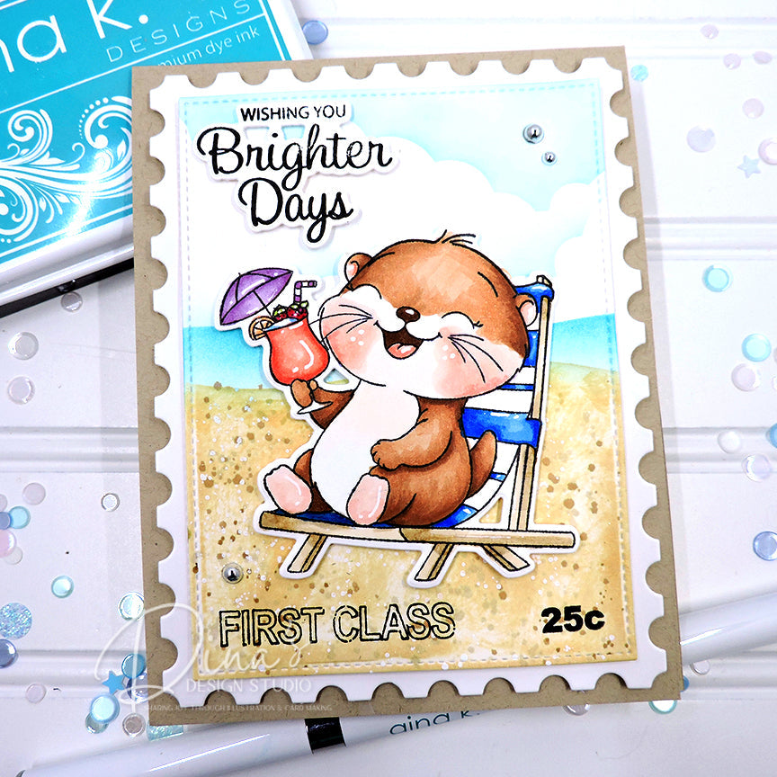 A postage stamp-style greeting card featuring a cartoon brown bear sitting on a beach chair at the beach, holding a cocktail umbrella. The card has scalloped edges, a kraft paper border, and the text 'Wishing You Brighter Days' and 'First Class 25c'.