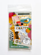 A packaged scrapbook or craft sticker/decal sheet from Fresh & Juicy Bits, featuring a colorful collage of autumn-themed elements including leaves, apples, a bird, envelopes, and decorative text on a white background.