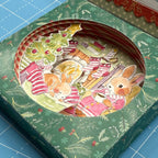 Art Impressions A Cozy Christmas Storybook Stamps and Template created scene with both the template and stamps bunnies christmas home side profile detail