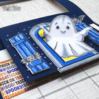 Card with a ghost design and Halloween text on a textured surface