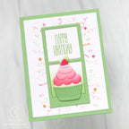 Birthday card with a pink cupcake and 'Happy Birthday' text on a white background
