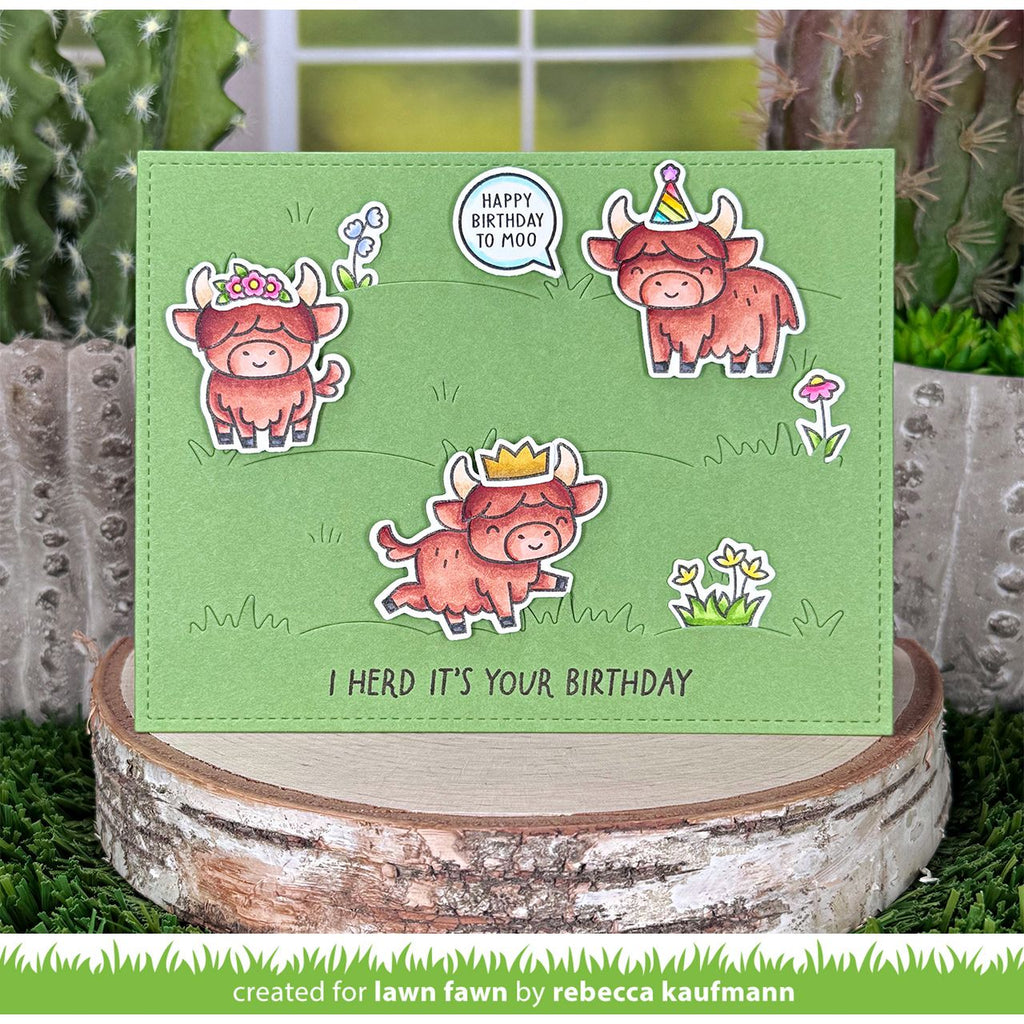 Birthday card with highland cows on a green background, featuring text 'Happy Birthday to moo' and 'I herd it's your birthday'.