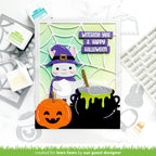 Halloween-themed card with a cat in a witch hat, pumpkin, and cauldron, surrounded by crafting tools.