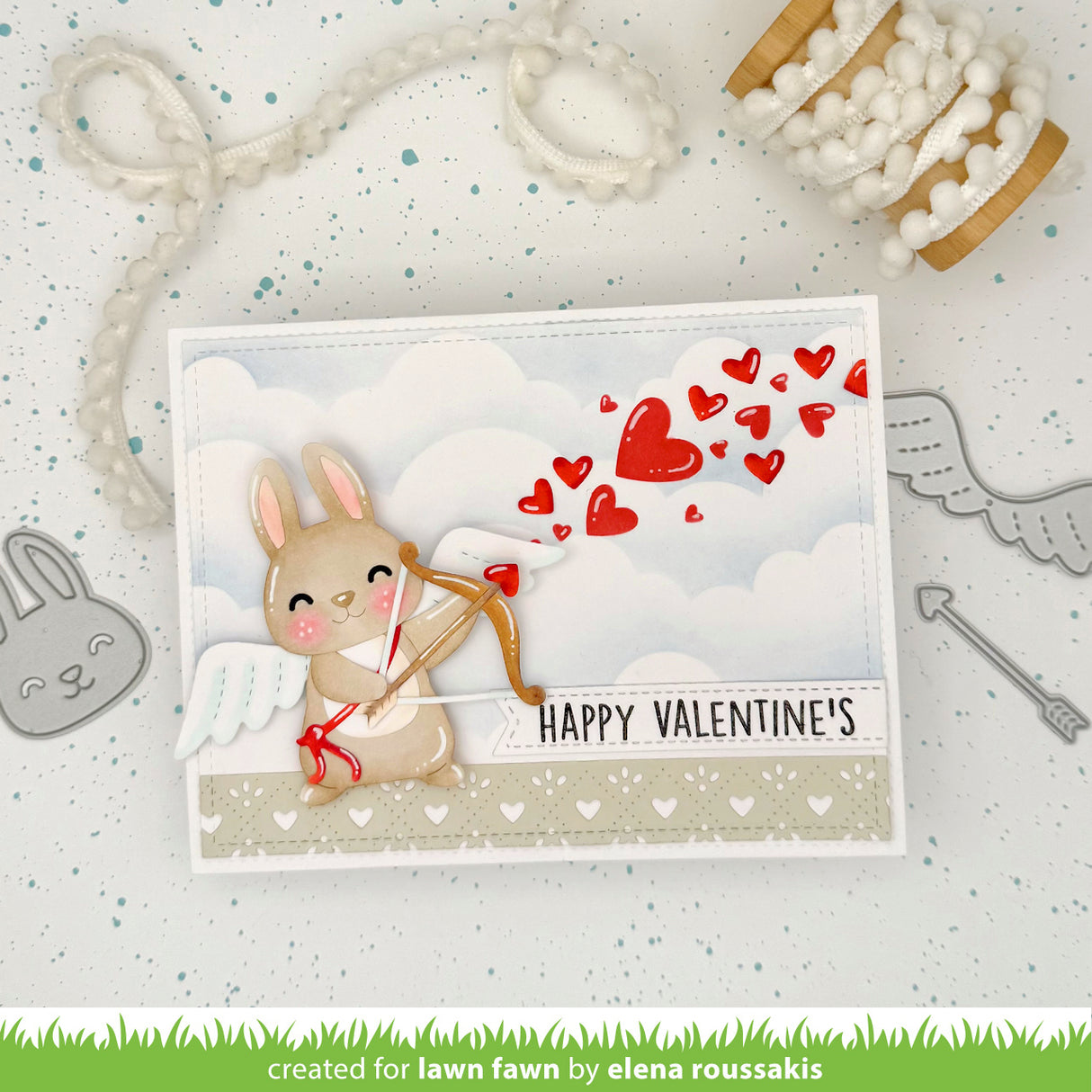 Valentine's Day card with a bunny holding a bow and arrow, surrounded by hearts on a light background.