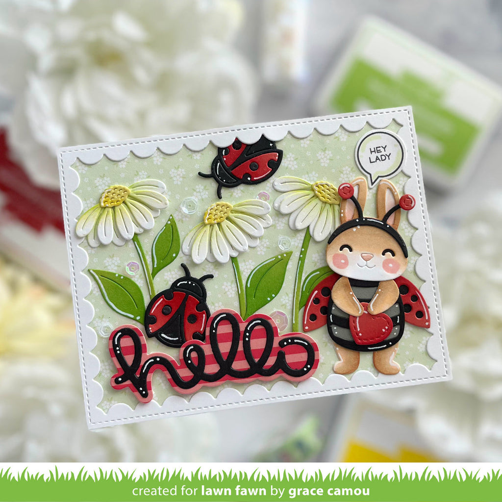 Card with a cute illustration of a bunny in a ladybug costume and ladybugs among flowers, with 'hello' text.