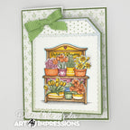 Card with a wooden potting bench and potted plants, featuring Art Impressions branding.