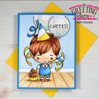 Card with boy blowing a party horn and holding a cupcake, with 'The Greeting Farm' branding.