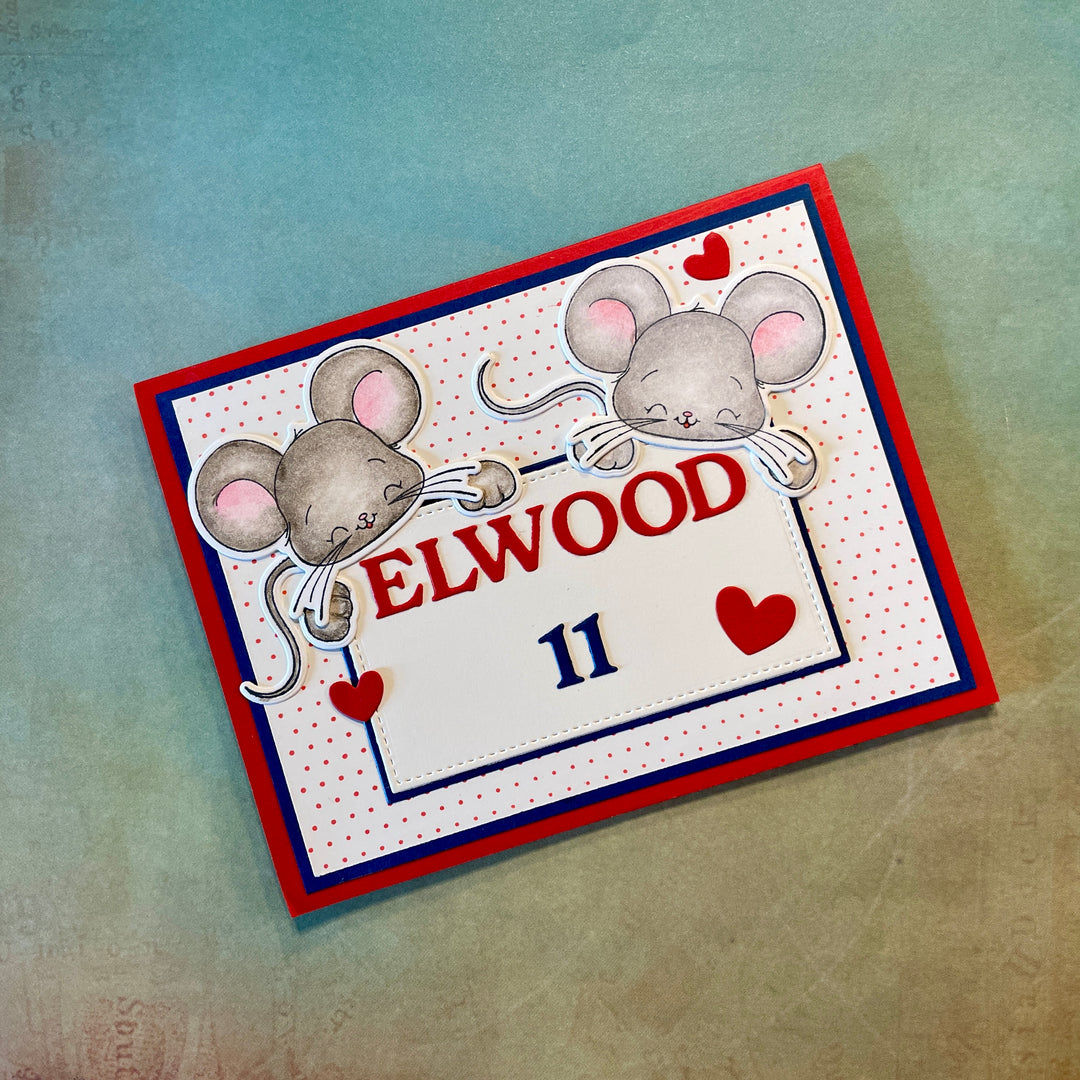 Card with cartoon mice holding a banner with 'ELWOOD 11' on a textured background