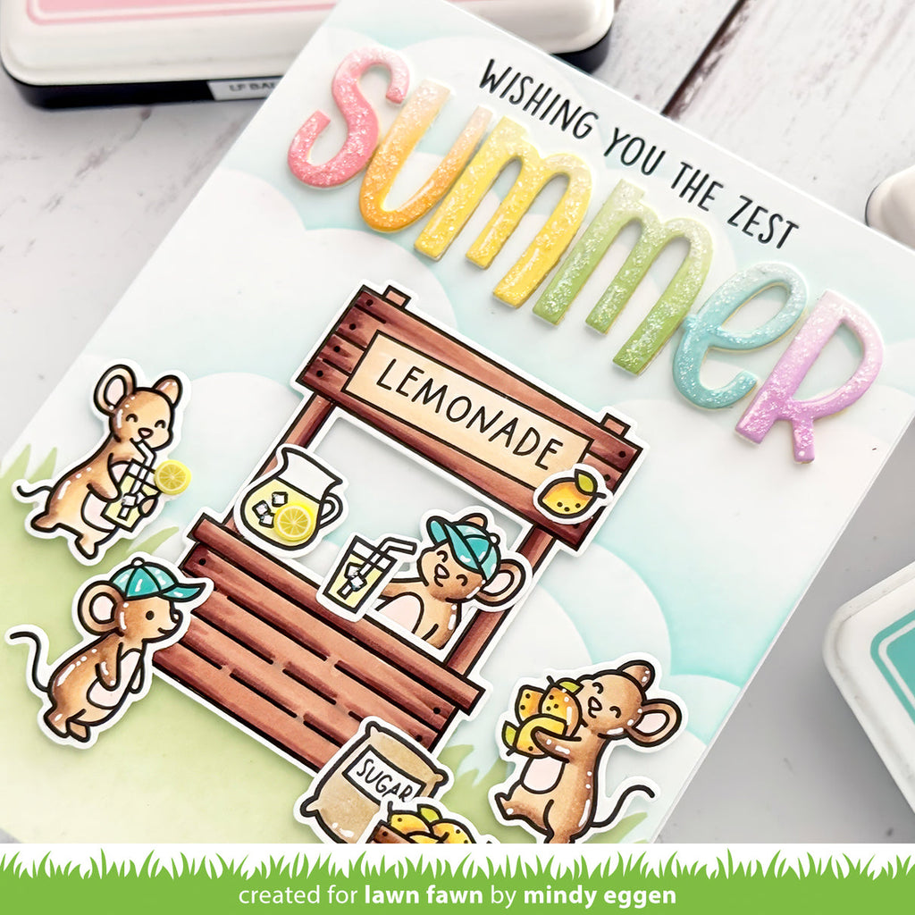 Card with lemonade stand illustration and 'summer' text, created for Lawn Fawn by Mindy Eggen.