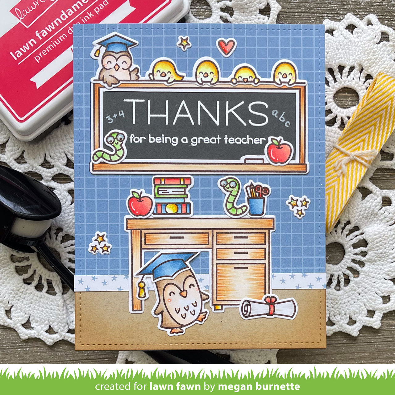 Card with owl design and 'Thanks for being a great teacher' text on a textured surface.