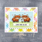 Card with two highland cows and 'Long Time No See' text on a colorful geometric patterned background.