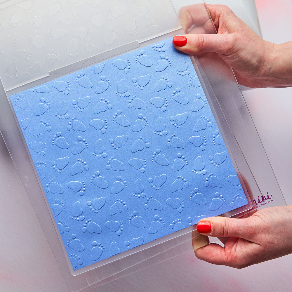 Chloe’s Creative Cards Baby Footprints Background 8x8 Embossing Folder c-8emb-baby blue