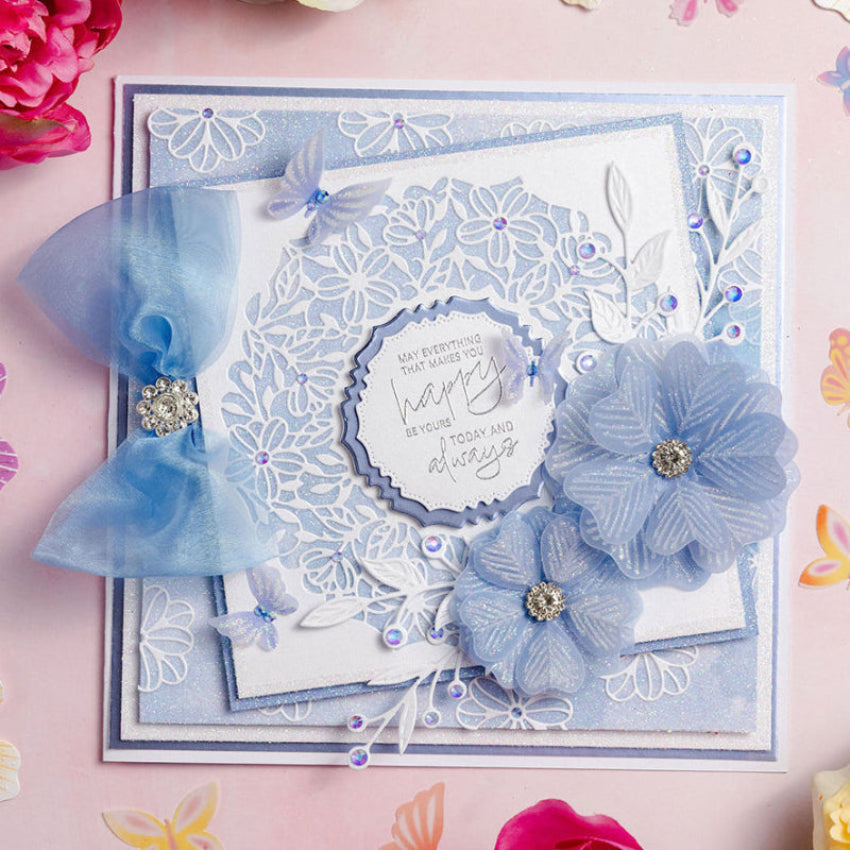 Chloe's Creative Cards Exquisite Lace Circle Dies c-mdie-exqc blue bow white floral background blue sparkle flowers card