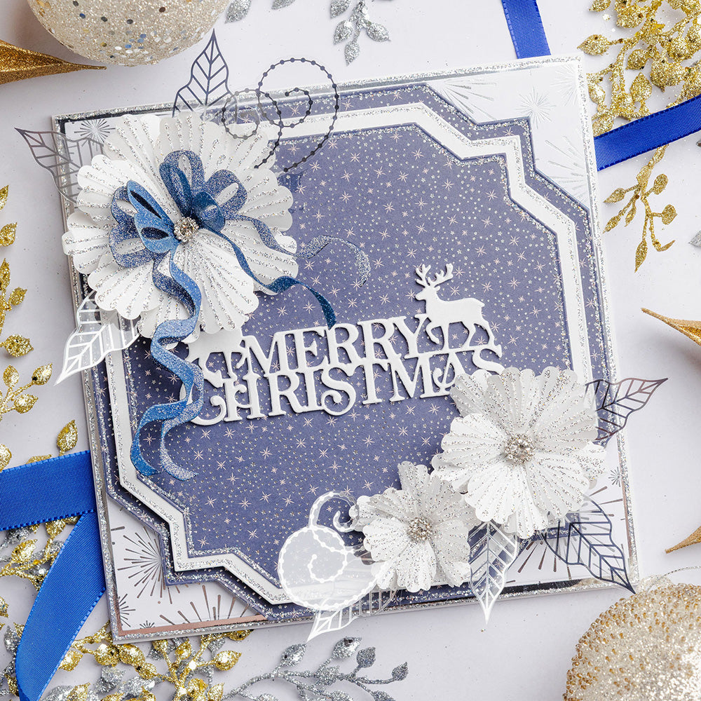 Chloe's Creative Cards Starlit Christmas 8x8 Designer Foiled Paper Pad c-fpad-navyc blue starred background white flower blue bow christmas card
