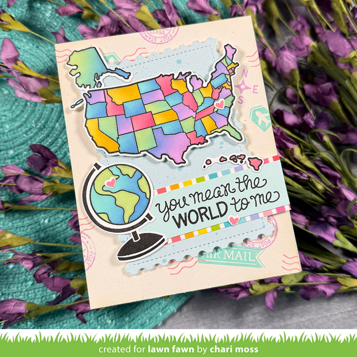 Colorful card with a map of the United States and 'you mean the world to me' text, surrounded by flowers.