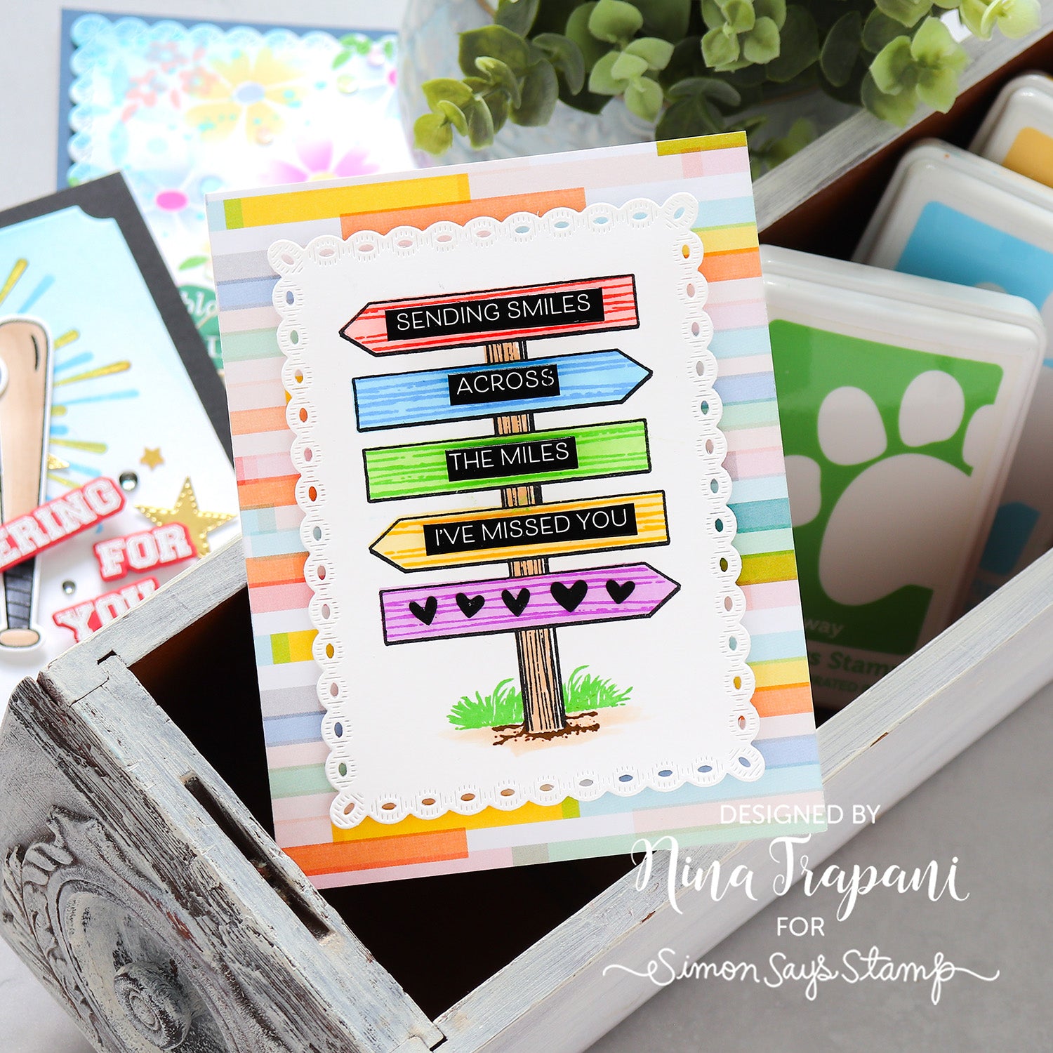 Colorful card with text and design elements, with sentiment Sending Smiles Across the Miles I've Missed You