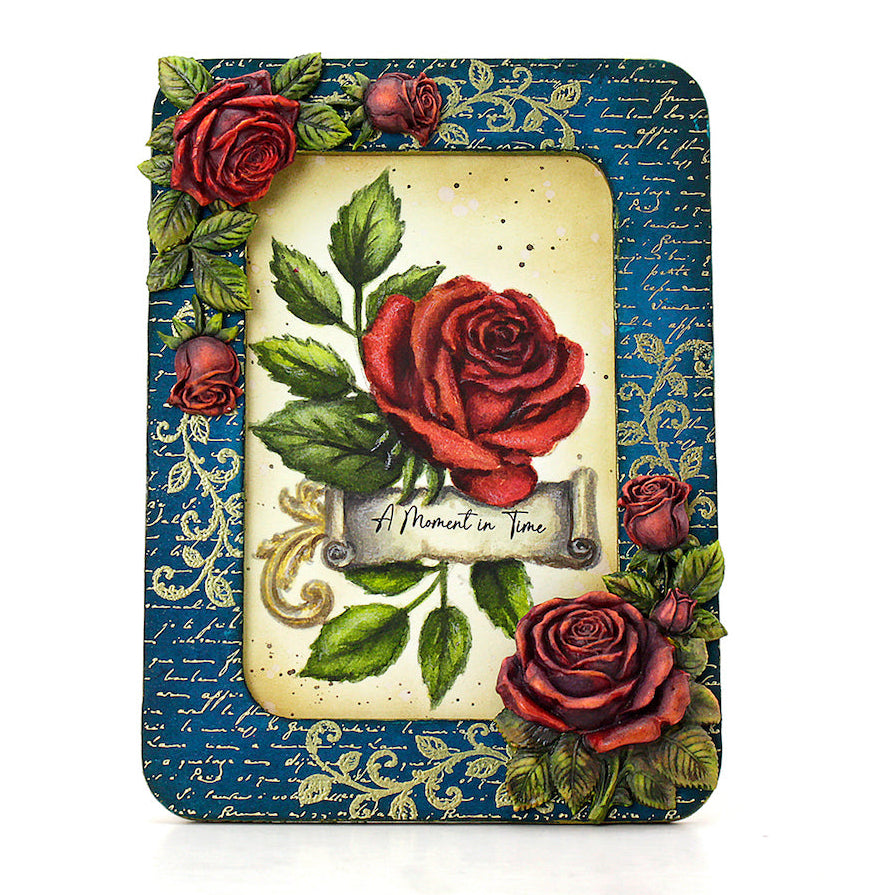Cosmic Shimmer Finishing Touch DL Clear Stamp Set 07-9002-cs roses blue background with gold writing border a. moment in time card