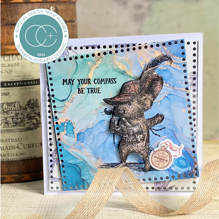 Craft Consortium Oliver's Adventures Let's Party Clear Stamps ccdwstmp011 gold compass with pink ribbon