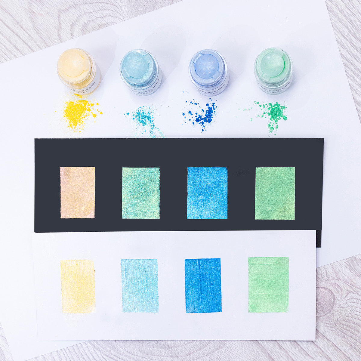 Crafter's Companion Aqua Shimmer Illusion Powders cc-ilp-aqsh Jars and Swatches on Black and White Cardstock