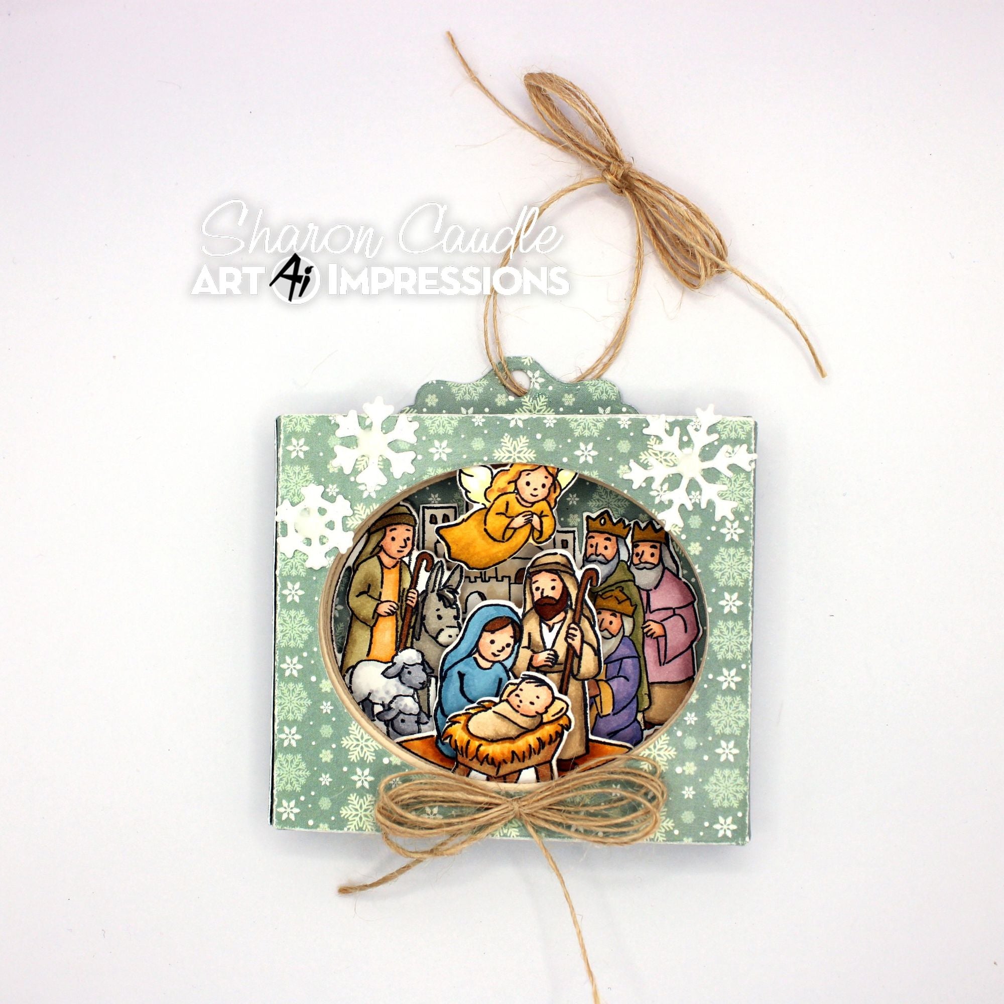 Decorative Christmas ornament with nativity scene design on a white background