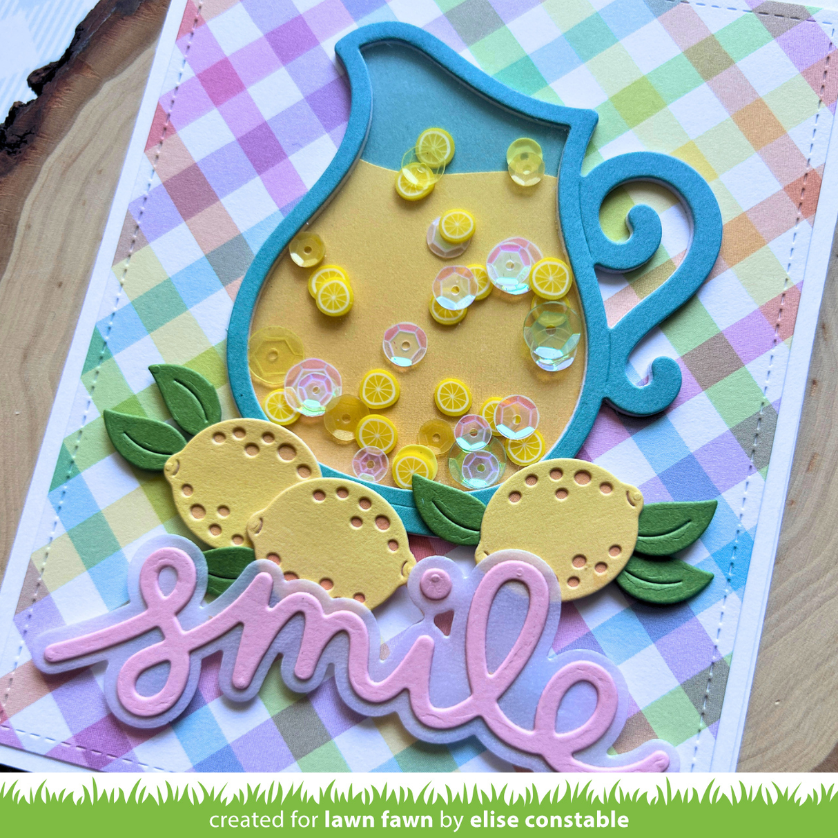 Decorative card with lemons and the word 'smile' on a checkered background