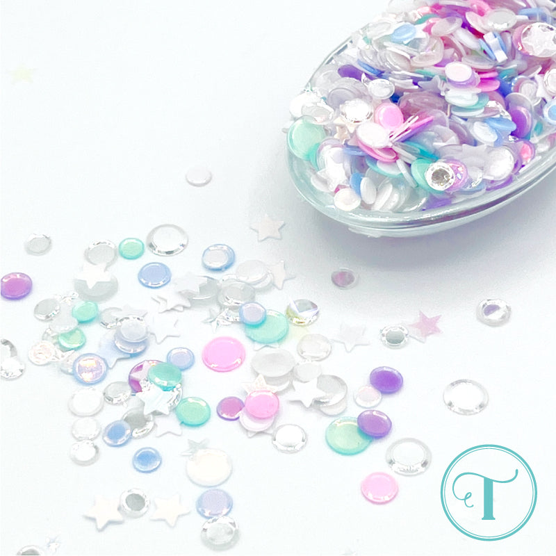 Trinity Stamps Candy Cottage Confetti Embellishment Mix emb-0010 spoon with stars, blue, pink, green, and crystal confetti