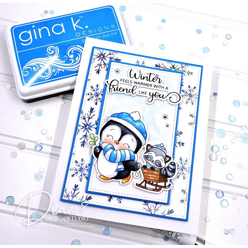 Card with penguin and raccoon design featuring text 'Winter feels warmer with a friend like you' on a white background with blue accents.