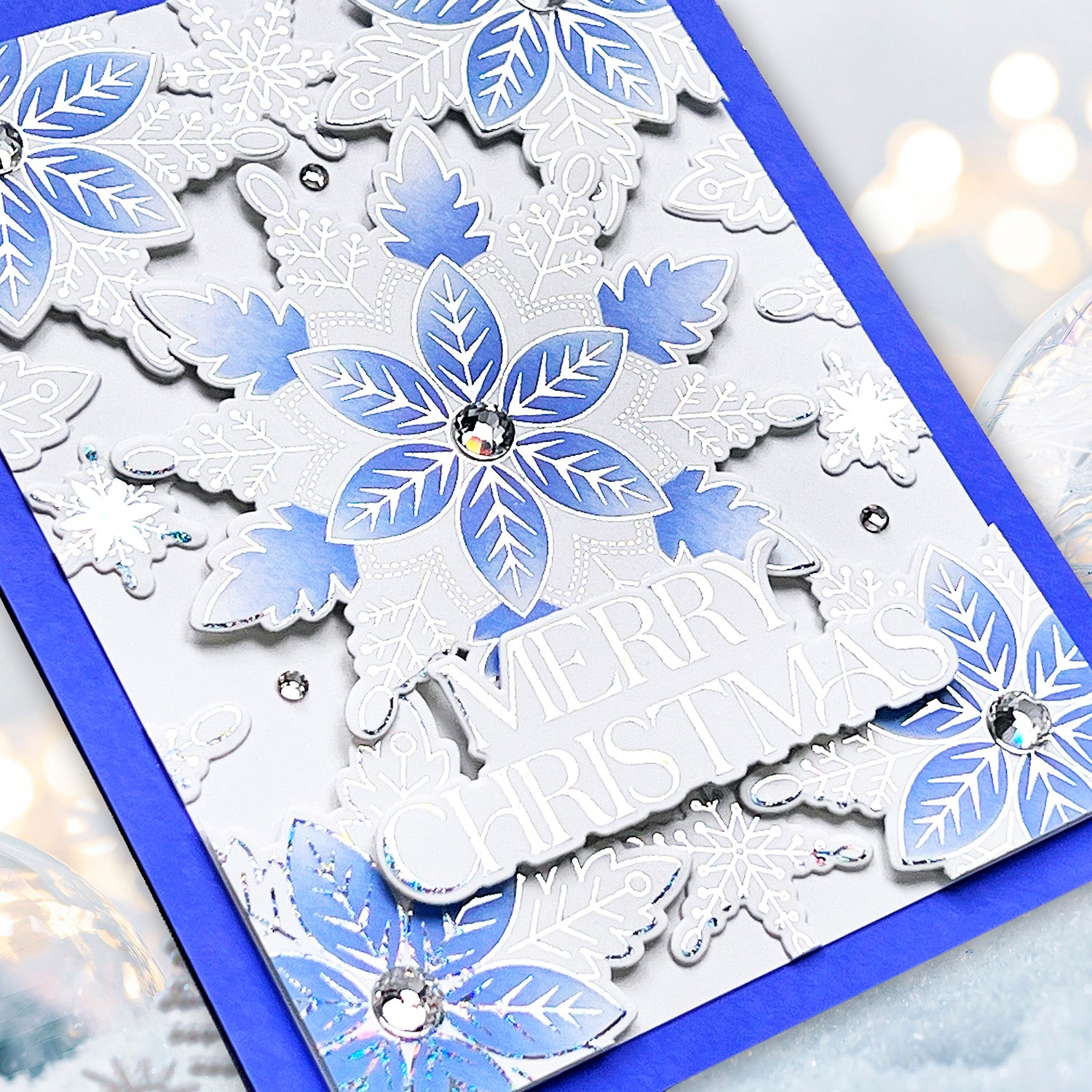 Gina K Designs Exclusive Limited Edition Christmas Star Flakes Poly-Glaze pgcsf Gina Krupsky Blue and White Foiled Holiday Card | color-code:ALT01