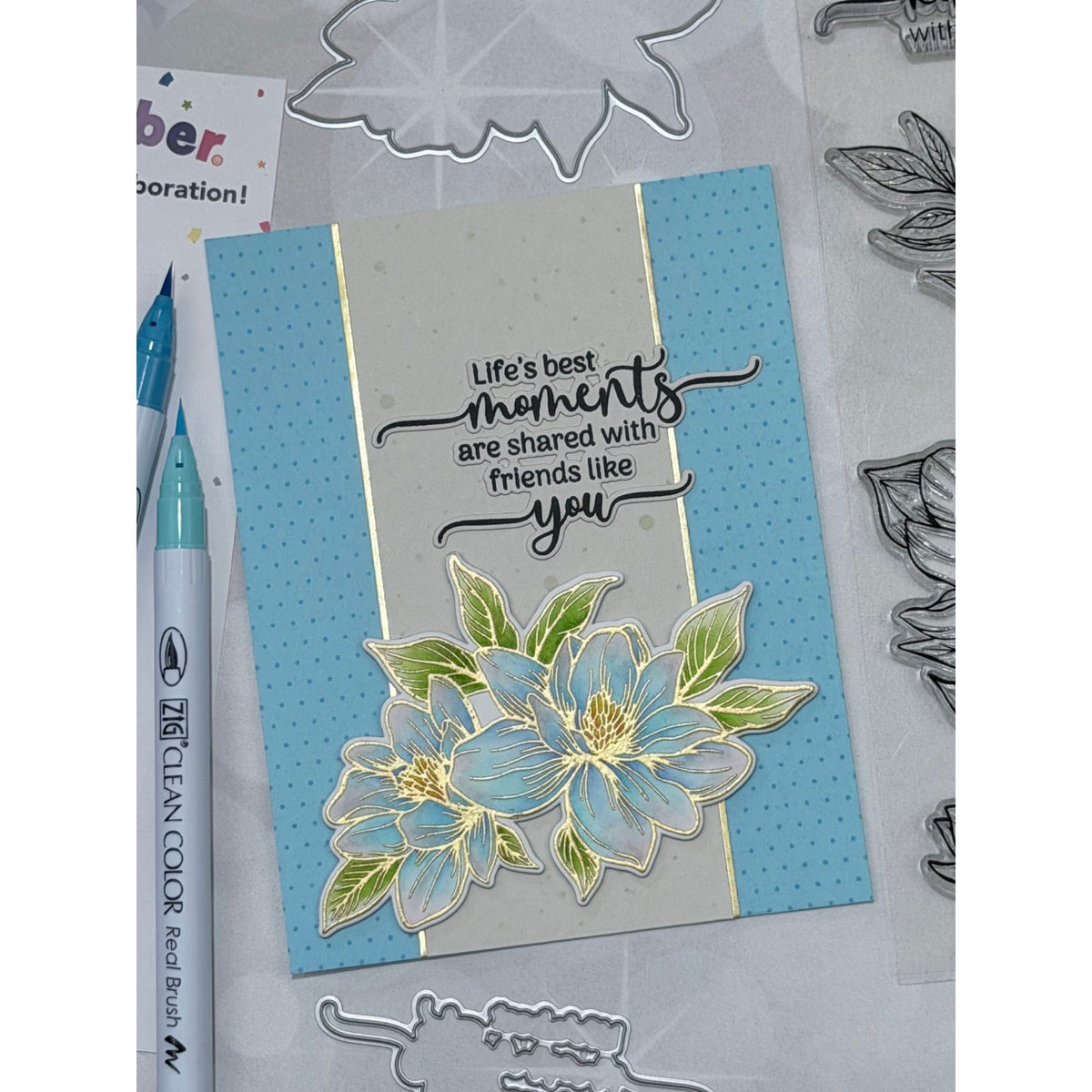 Gina K Designs Life’s Best Moments STAMPtember Exclusive Stamps And Dies Floral Friend Card Light Blue and Metallic Gold
