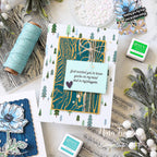 Card with nature-themed design and decorative elements on a white surface