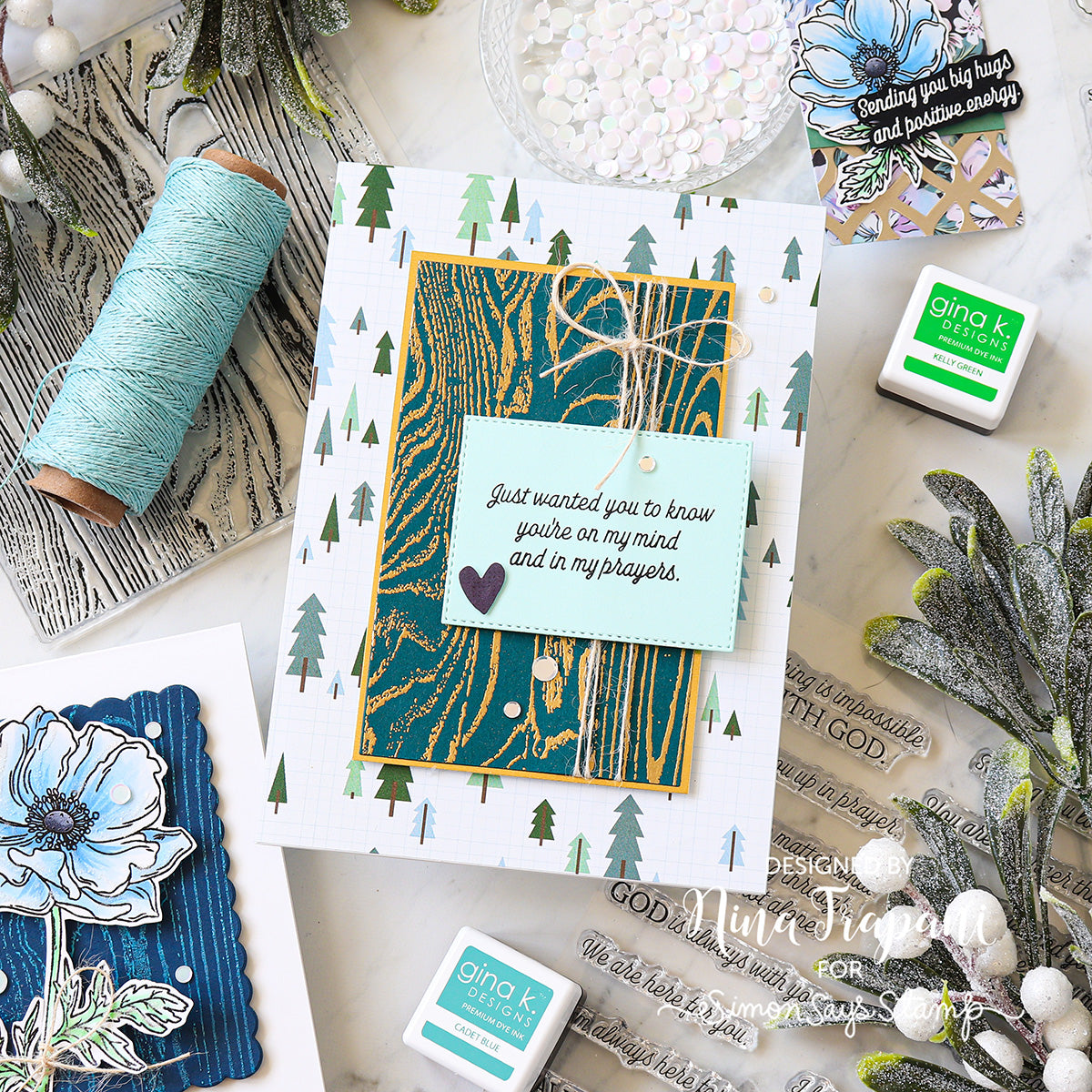 Card with nature-themed design and decorative elements on a white surface