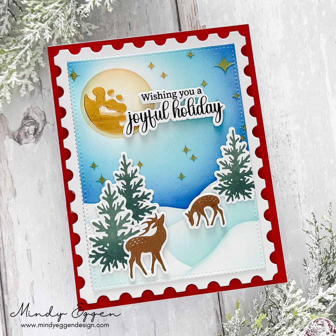 Handmade Holiday Card with Postage Border Snowy Scene Grazing Deer and sentiment 'Wishing you a joyful holiday'