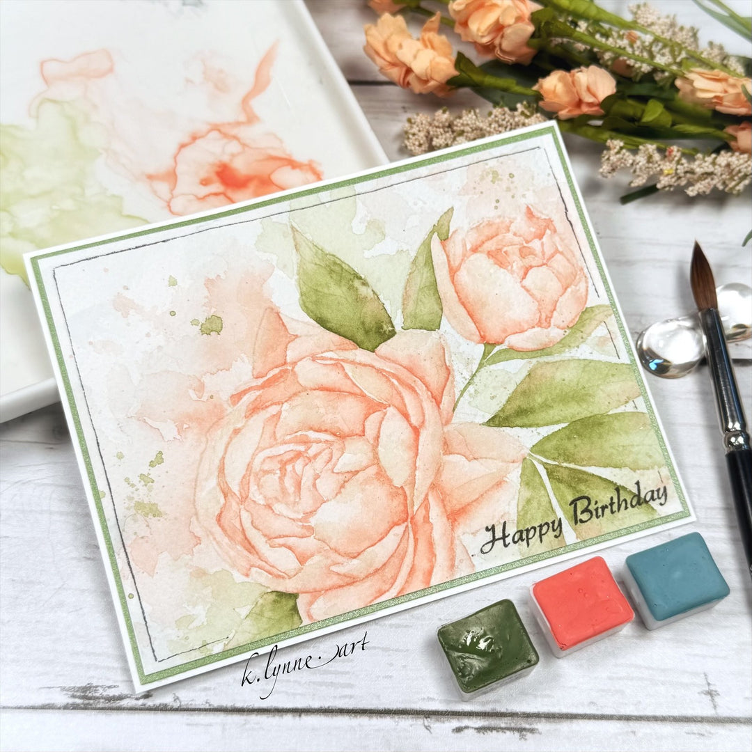 Handmade birthday card with floral design and watercolor effects with Happy Birthday Sentiment