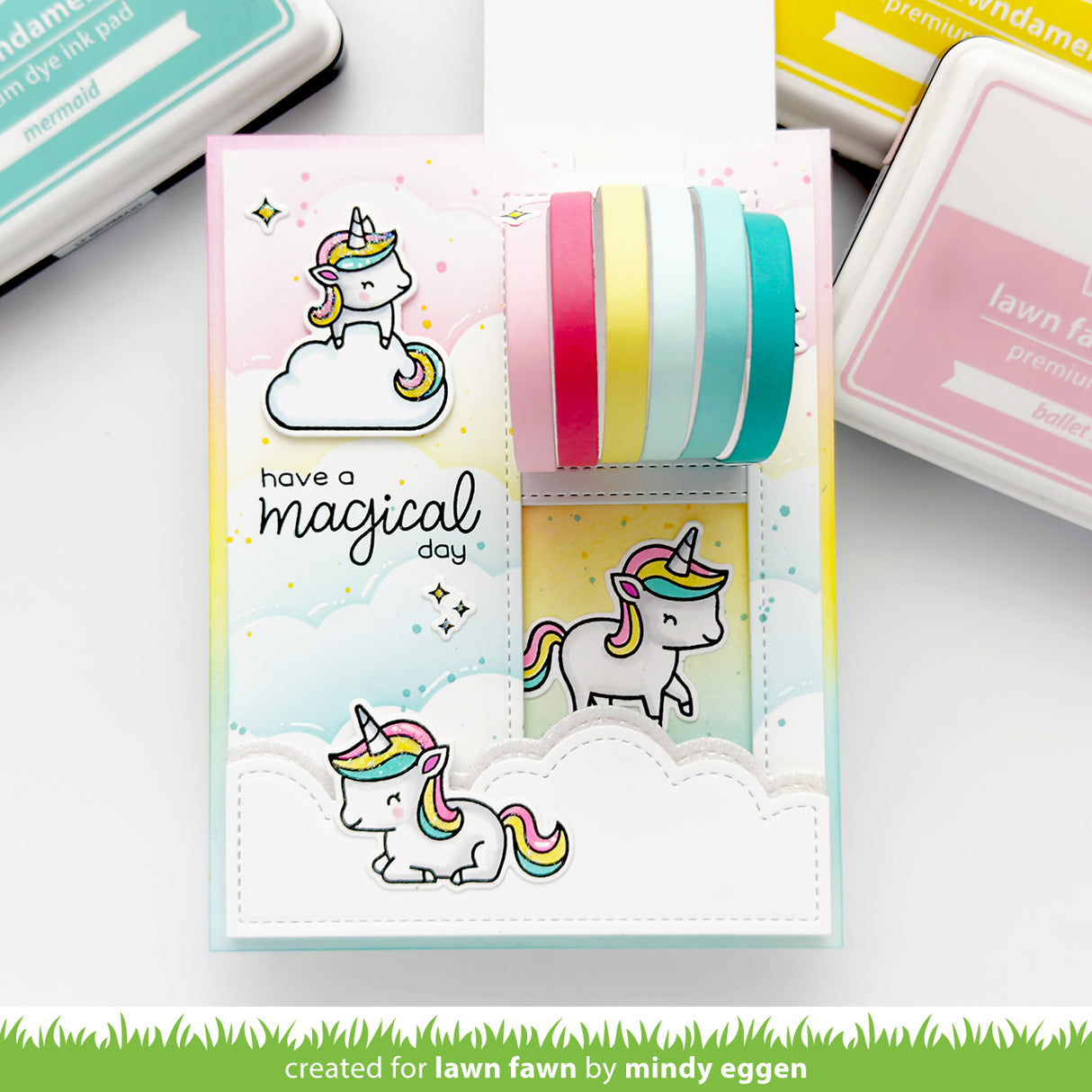 Interactive Rainbow Card with Unicorns and sentiment 'Have a Magical Day'