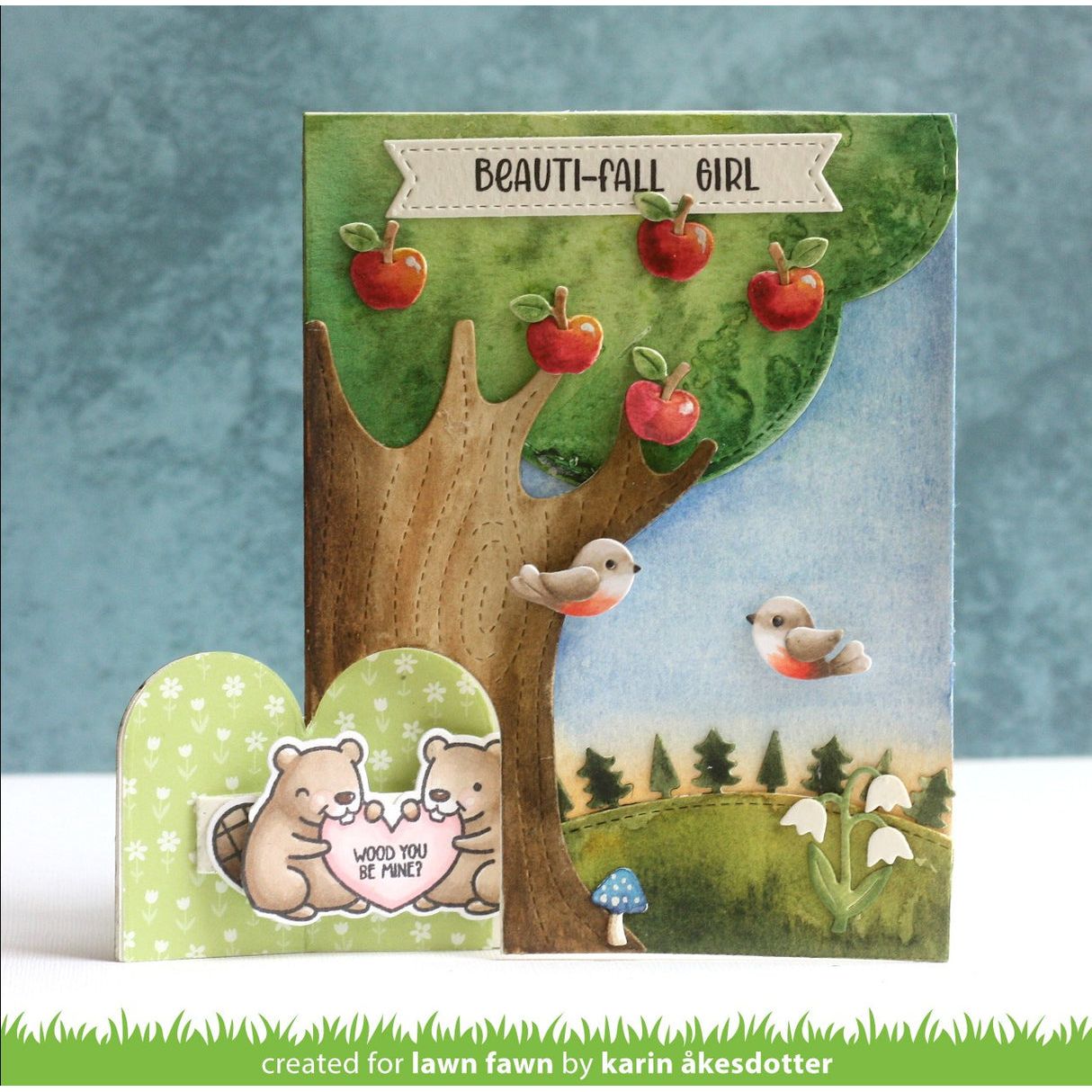 Card with tree, birds, and bears design on a blue background | color-code:alt1