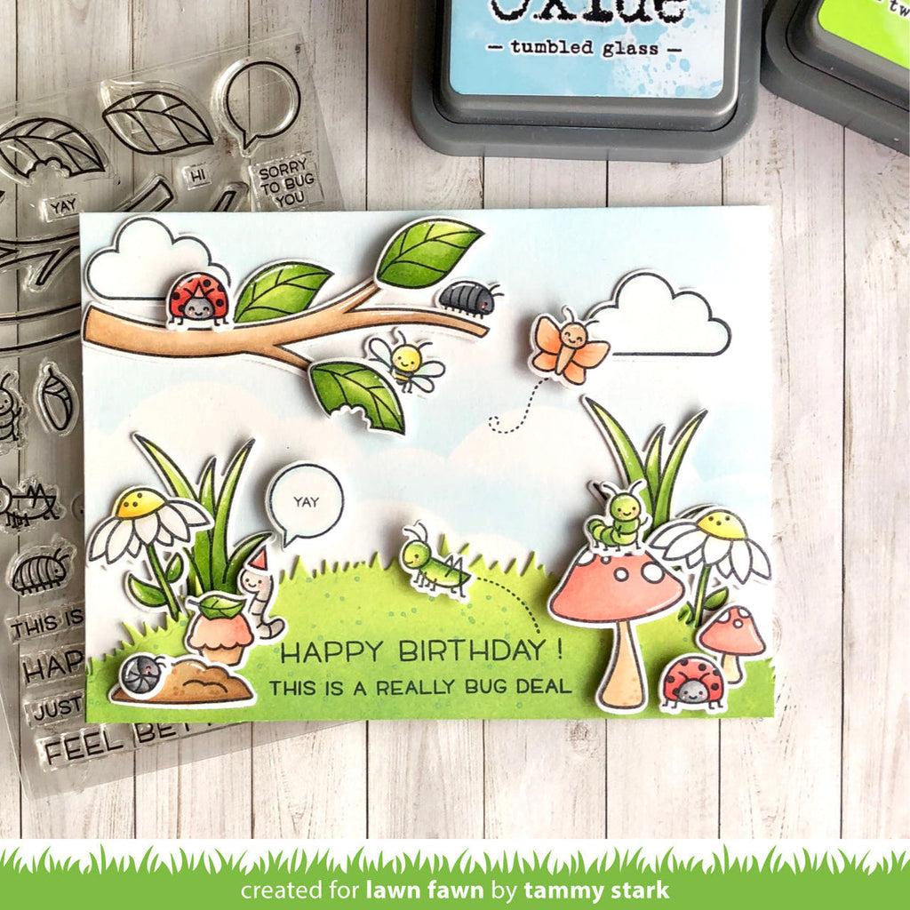 Card with nature-themed design featuring insects and plants with happy birthday sentiment