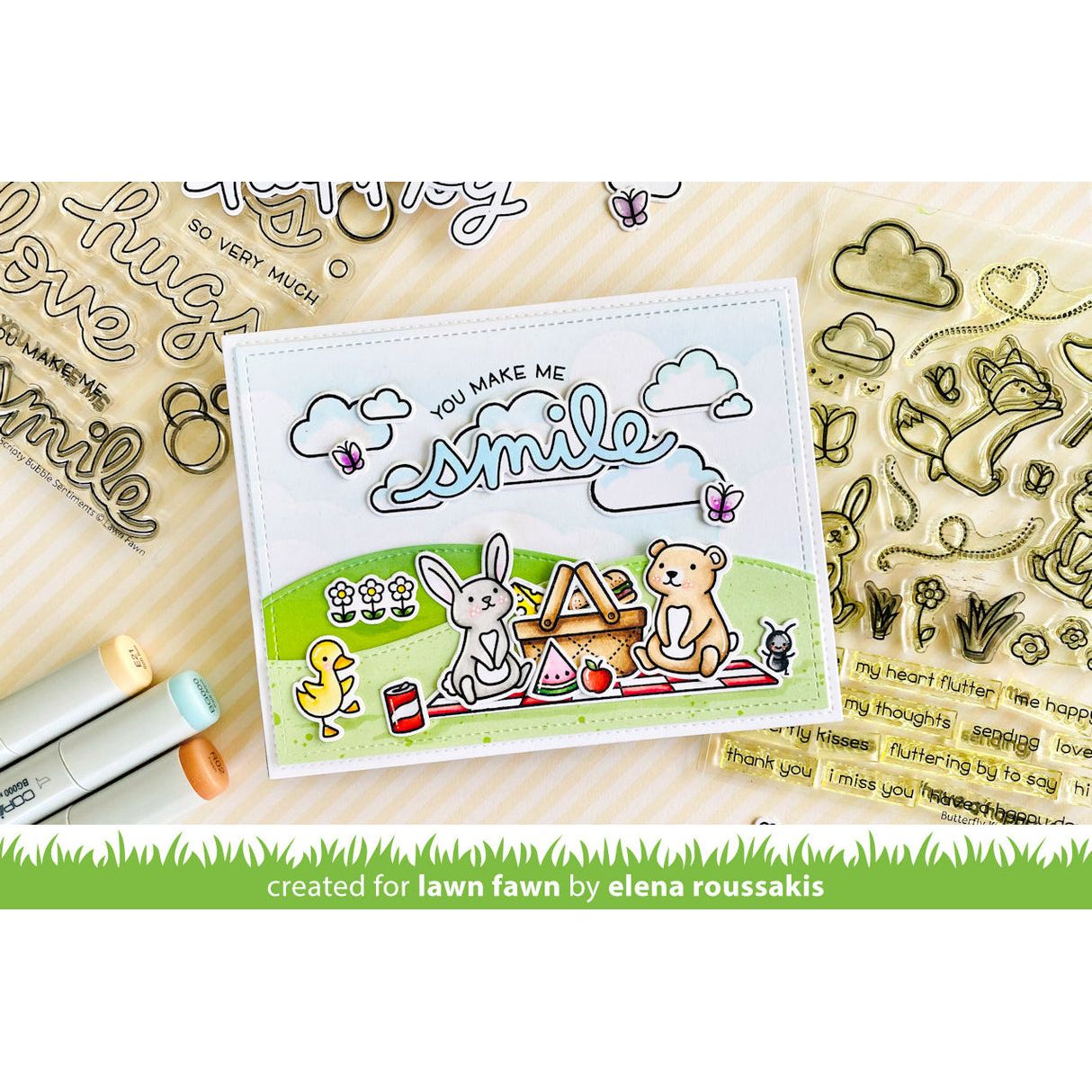 Lawn Fawn Butterfly Kisses Stamps Dies and Coloring Stencils You Make Me Smile Sentiment Card with picnic scene featuring rabbit bear, duck, ant