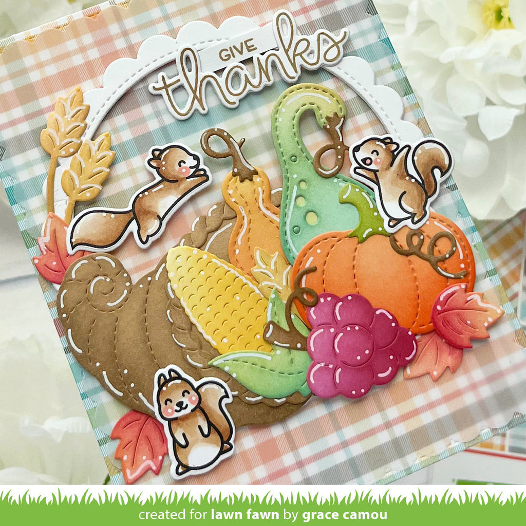 Thanksgiving-themed card with autumn elements and 'Give Thanks' text.