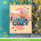 Decorative card with cat illustrations and text 'have a cozy day' on a textured background.
