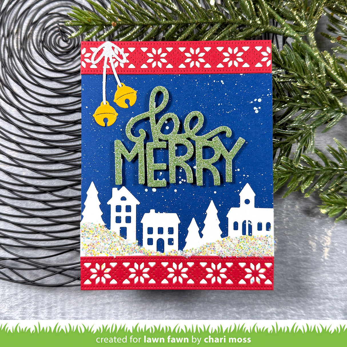 Christmas card with 'Be Merry' text and festive design, featuring bells and a village scene.