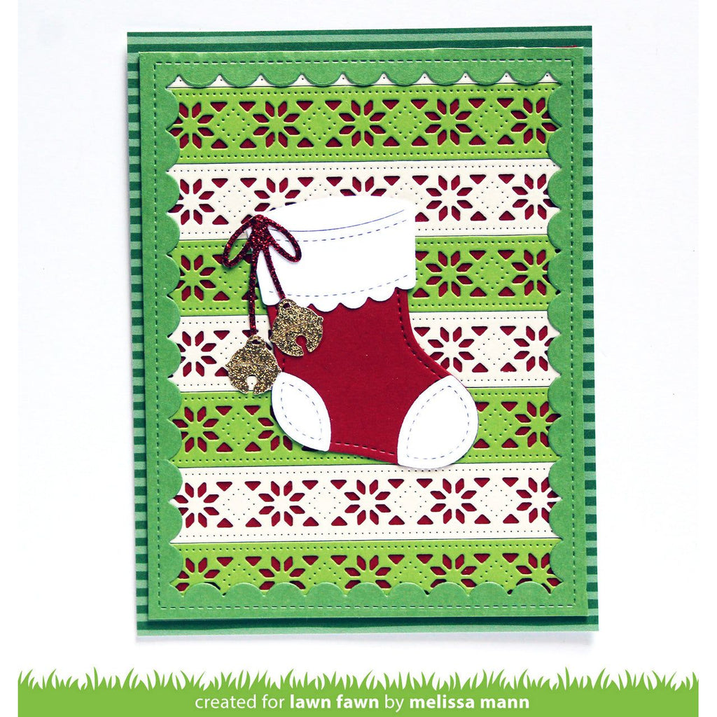 Decorative card with a red stocking and green patterned border, created for lawn fawn by Melissa Mann.