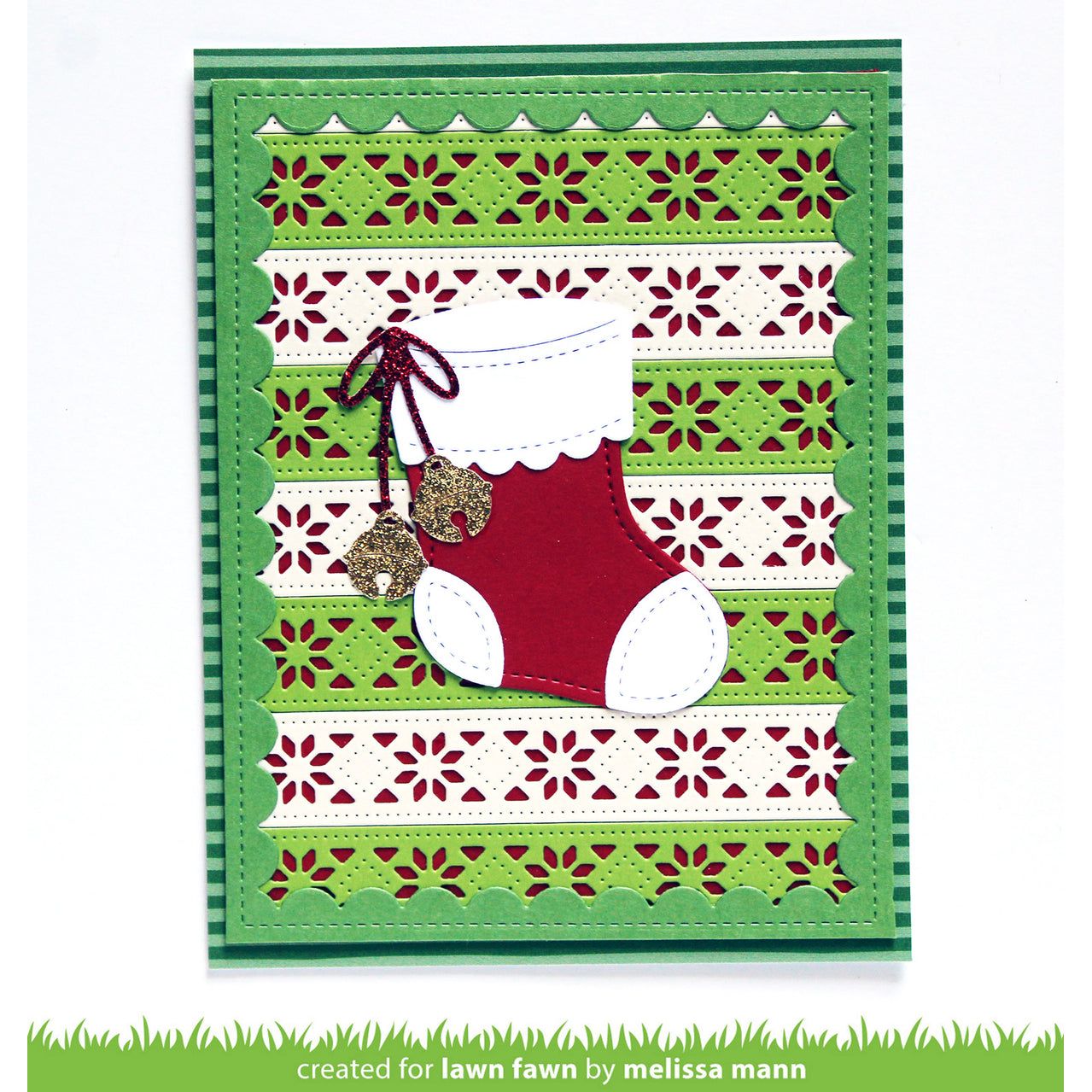 Decorative card with a red stocking and green patterned border, created for lawn fawn by Melissa Mann.