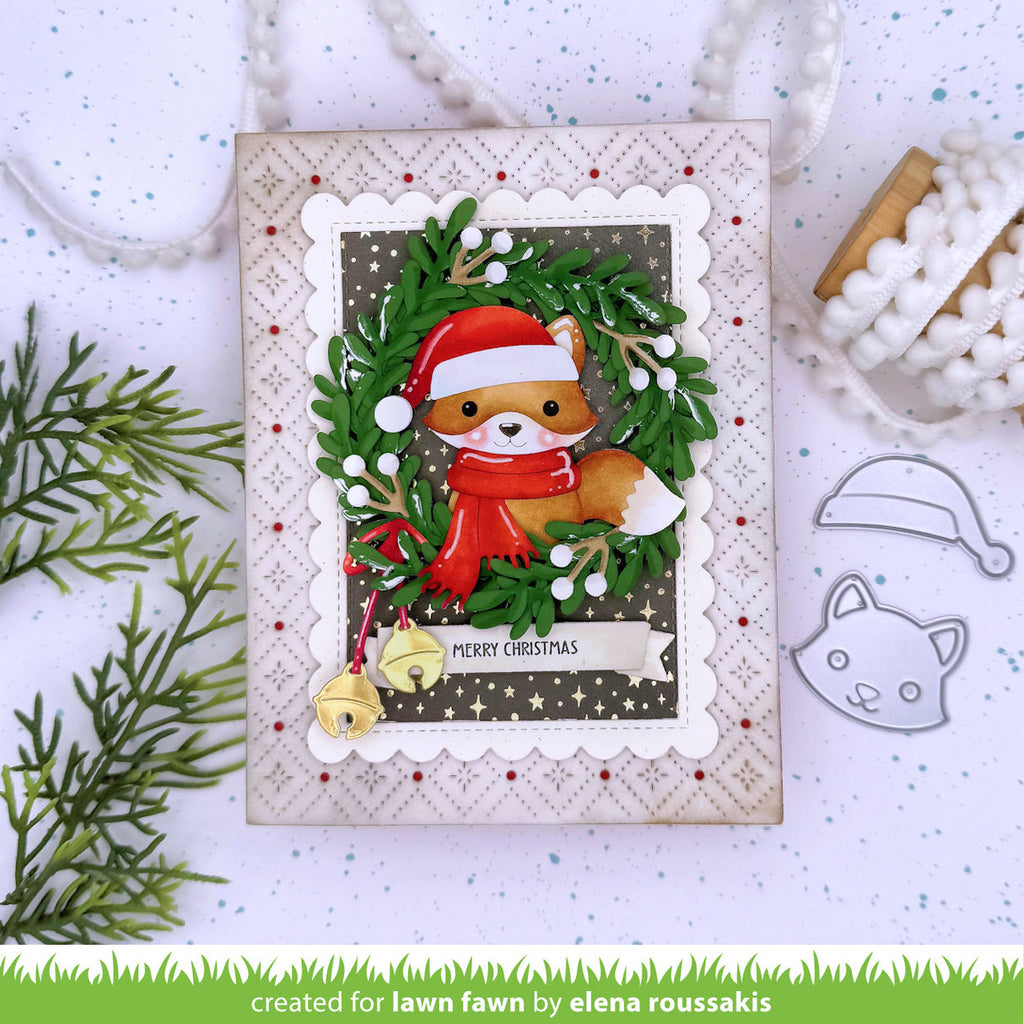 Christmas card with fox in a wreath and Santa hat on a white background
