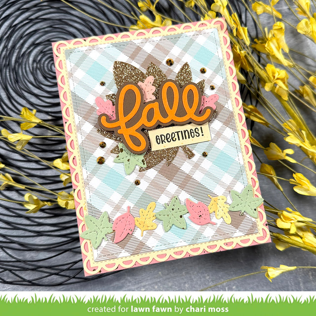 Autumn-themed card with 'fall greetings' text and decorative elements on a textured surface.