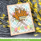 Autumn-themed card with 'fall greetings' text and decorative elements on a textured surface.