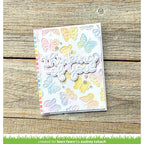 Card with colorful butterflies and 'thinking of you' text on a wooden surface, created for Lawn Fawn by Audrey Tokach.