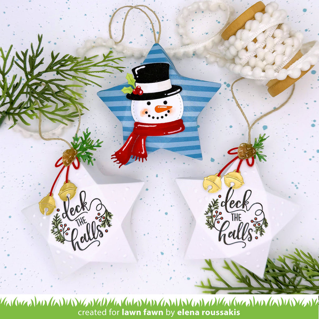 Christmas-themed decorations with snowman and 'deck the halls' text on a white background.
