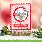 Christmas card with mouse design on a pink background, featuring the text 'Season's Greetings'.